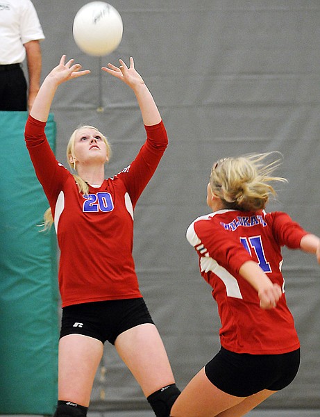 &lt;p&gt;Columbia Falls junior Hope Burlage (20) sets the ball for Taylor
Peterson ( 11) during the first set against Whitefish on Thursday
night in Whitefish.&lt;/p&gt;