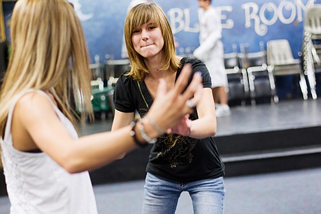 &lt;p&gt;Ashley Mobraten, a senior at Lake City High School, engages in an exercise in her improv class on Friday. Coeur d'Alene School District 271 trustees decided against seeking an emergency property tax levy and are expected to begin assessing the need for a supplemental levy later this year.&lt;/p&gt;