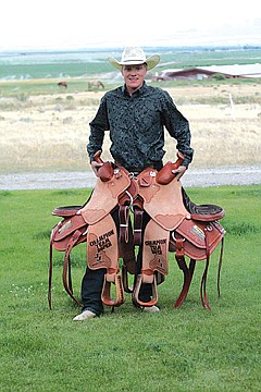 &lt;p class=&quot;p1&quot;&gt;Wyatt Lytton poses with his two trophy saddles.&lt;/p&gt;