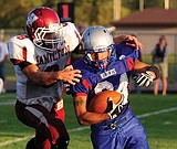 Cats roughed up by Broncs