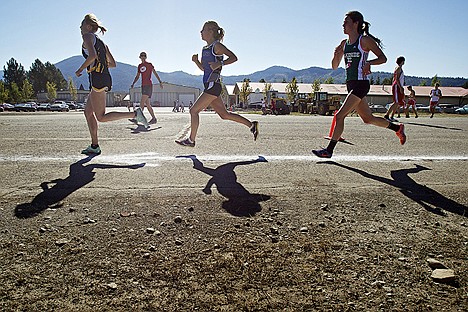 &lt;p&gt;Racers sprint along the route behind Silverwood Theme Park as they begin their second lap of the girls varsity race.&lt;/p&gt;