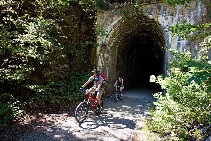&lt;p&gt;Brad and Robin Haws, of Spokane, pass through a tunnel on the Route of the Hiawatha bike trial that was once a railroad.&lt;/p&gt;