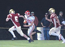 Junior halfback Zack Carver advances the ball for Arlee duing their 46-20 win over Philipsburg.