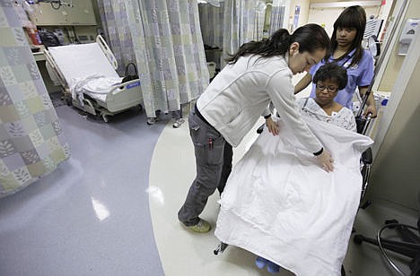 &lt;p&gt;In this file photo taken, Nov. 30, 2010, nurses at University of Chicago Medical Center in Chicago prepare patient Paula Ellis to be transported for tests. While the U.S. job market has steadily improved, one area where Americans have not seen gains since the recession is pay raises. In this file photo taken, Nov. 30, 2010, nurses at University of Chicago Medical Center in Chicago prepare patient Paula Ellis to be transported for tests. While the U.S. job market has steadily improved, one area where Americans have not seen gains since the recession is pay raises.&lt;/p&gt;