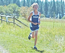 Freshman Karl Daniels runs during the Ronan Canal Bank Run last Friday in Ronan.