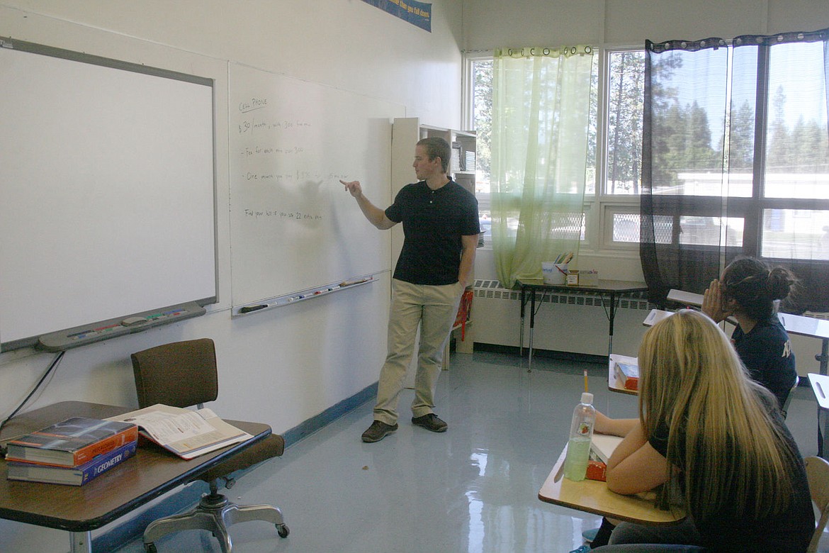 <p>Peter Waldy teaches his algebra class at the Superior High School last week.</p>