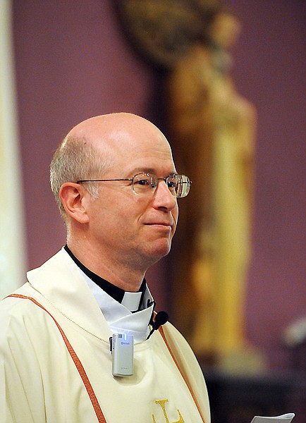 &lt;p&gt;Father Rod Ermatinger of Saint Matthew's gives the homily at
mass on Friday morning in Kalispell. Follow mass Father Rod, and
students, staff and family members processed from the church to the
Kalispell Fire Departmetn carrying 343 flags honoring the first
responders killed during the 9/11 attacks.&lt;/p&gt;