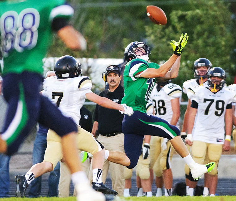 &lt;p&gt;Glacier wide receiver Sam McCamley (18) hauls in a pass for a 99-yard touchdown Friday night in the third quarter against Billing West at Legends Stadium.&lt;/p&gt;