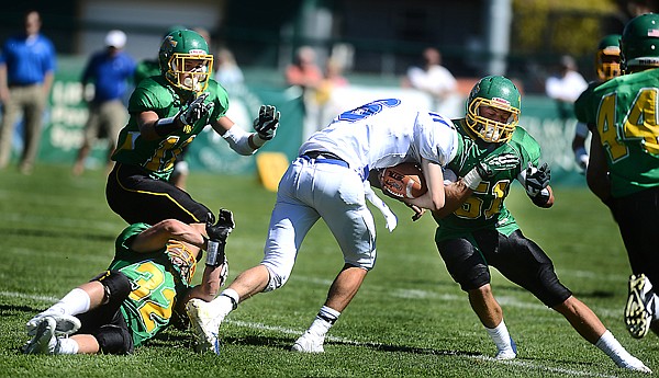 &lt;p&gt;Whitefish senior Gage Smith (51) stops a run by Havre quarterback Dane Warp (6) during the second half of their game on Saturday, August 31, in Whitefish. Whitefish won the match up 45 to 27. (Brenda Ahearn/Daily Inter Lake)&lt;/p&gt;