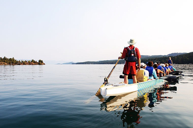 &lt;p&gt;Doug Coats steers the boat for team Major Threat as they paddle out toward the middle of the lake Wednesday evening during a Dragonboat practice in Somers Bay on Flathead Lake. Aug. 28, 2013 in Somers, Montana. (Patrick Cote/Daily Inter Lake)&lt;/p&gt;