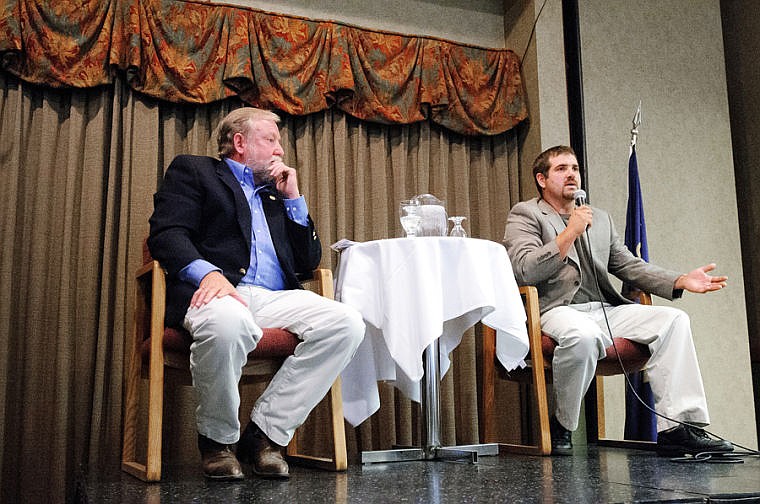 &lt;p&gt;Jim Lynch, left, and Chad Graham discuss the future of the Kalispell City Airport on Tuesday afternoon during the Kalispell Chamber of Commerce's monthly luncheon at the Red Lion Hotel. Aug. 27, 2013 in Kalispell, Montana. (Patrick Cote/Daily Inter Lake)&lt;/p&gt;