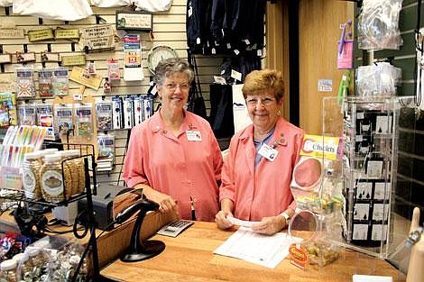 Jason Shueh/Valley Press Bea Dobbelaere, left, and Alice Balbi stand next over the front desk of the Mementos gift shop.