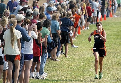 Flathead&#146;s Tera Klein sprints towards the finish line during Saturday&#146;s Flathead Invitational cross county meet held at Kidsport Complex in Kalispell. Craig Moore/Daily Inter Lake