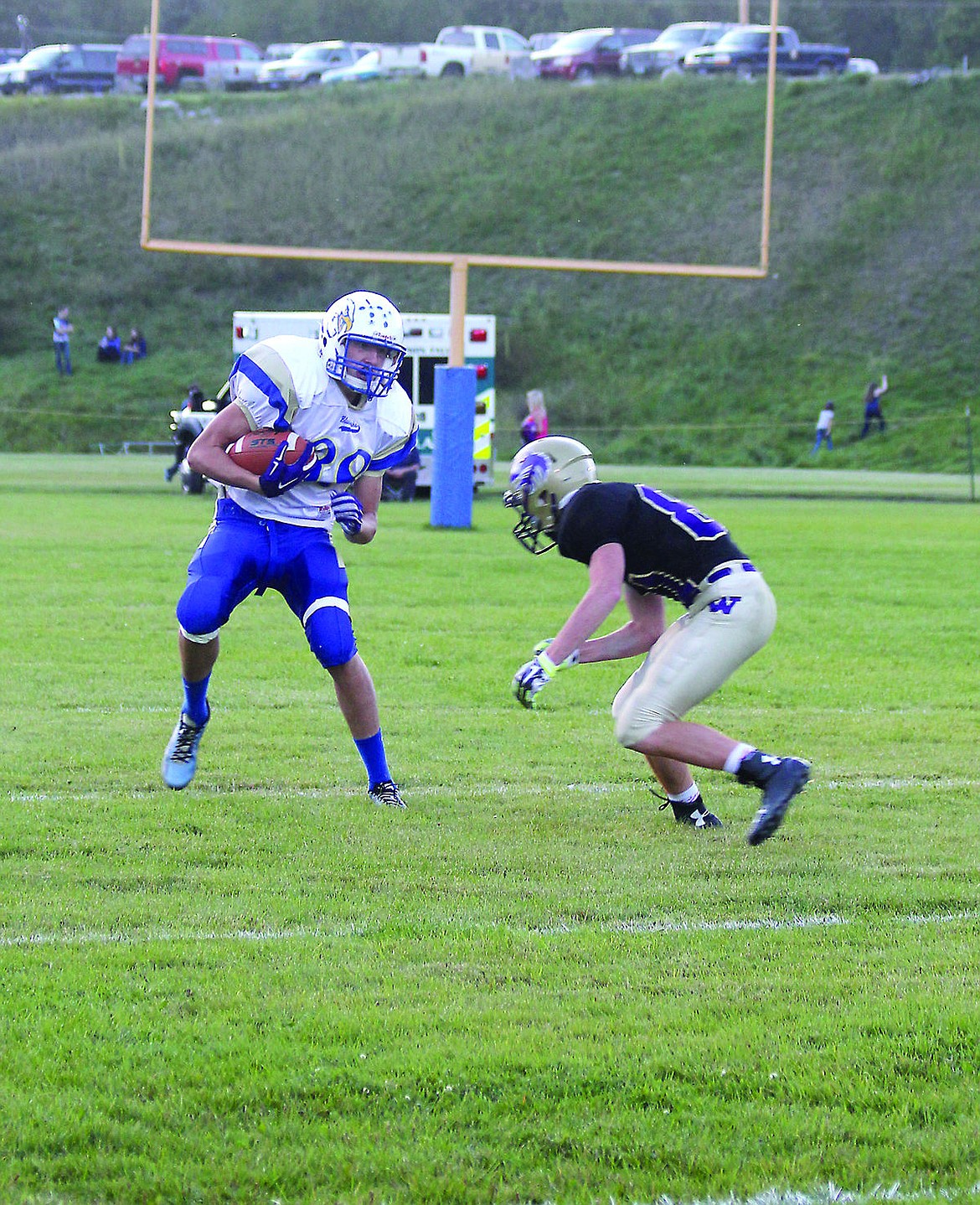 &lt;p&gt;Trais Hoisington plans his next step during the Thompson Falls football game against Cut Bank.&lt;/p&gt;