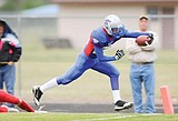 Baumgartner leads Cats to 42-0 blitzing of Browning