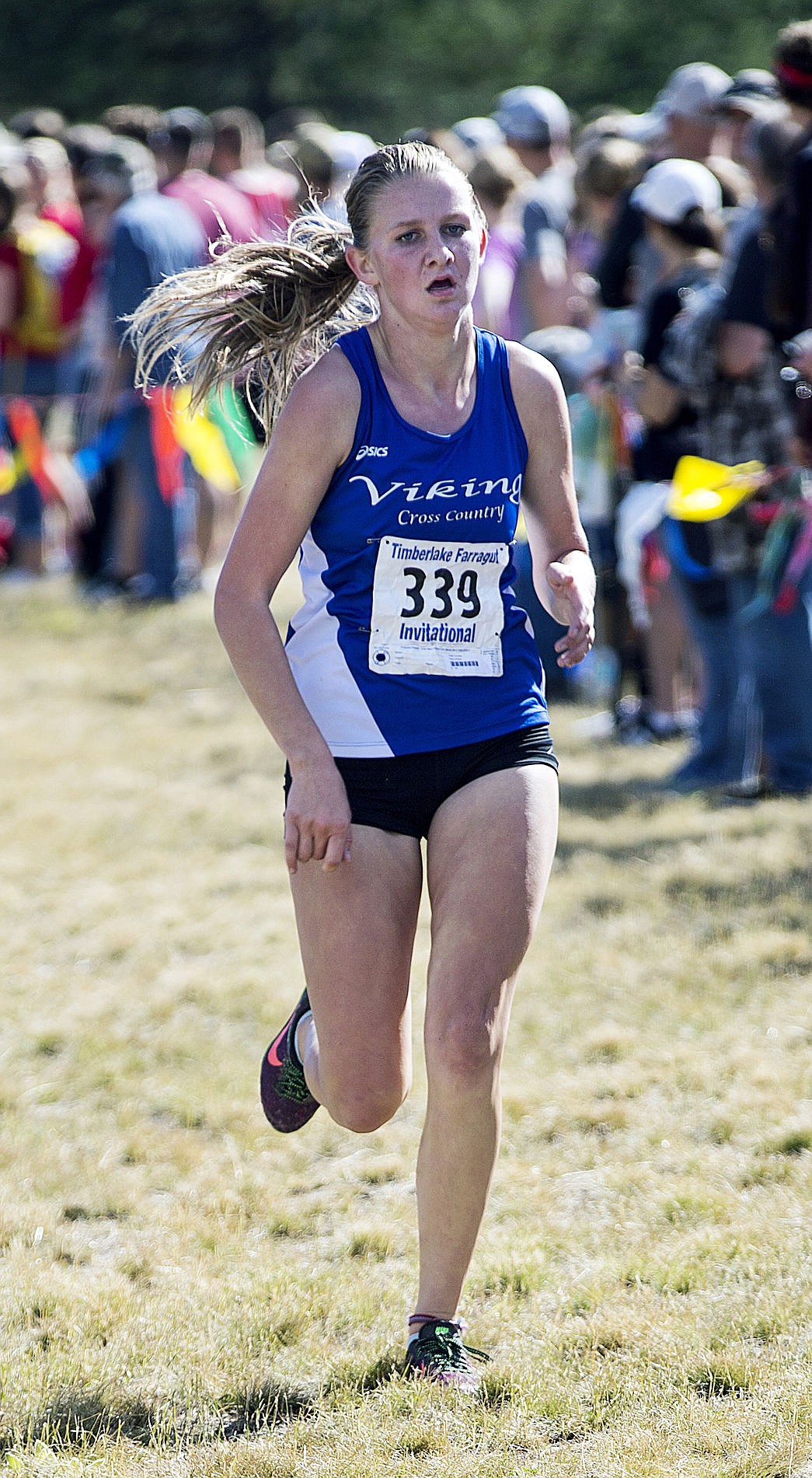 &lt;p&gt;LOREN BENOIT/Press Coeur d'Alene senior Caitlin Conway runs towards the finish line during the Farragut Invitational on Saturday. Conway finished with a time of 19 minutes, 58 seconds.&lt;/p&gt;