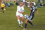 Short-handed Lady Bulldogs split two games