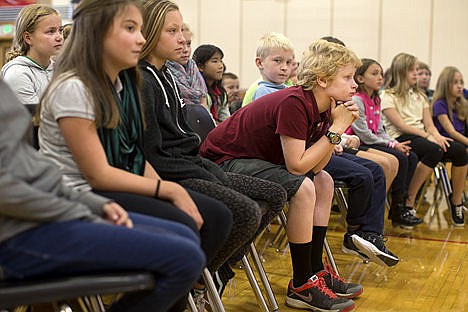 &lt;p&gt;Oskar Hepworth leans forward as he and 63 of his fifth-grade classmates listen to Coeur d&#146;Alene artist Mel McCuddin speak about his work Tuesday at Sorenson Magnet School of Arts &amp; Humanities in Coeur d&#146;Alene.&lt;/p&gt;