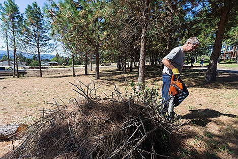 &lt;p&gt;A worker hired to remove trees from an easement area on the Meyer&#146;s property stops work as Press staff approach the job site on Wednesday.&lt;/p&gt;