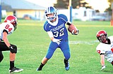 Broncos football turns back Warden Cougars