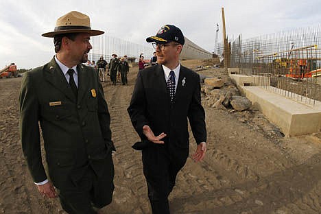 &lt;p&gt;Jeff Reinbold of the National Park Service, left, walks with Gordon Felt, who lost his brother Edward Felt on Flight 93, during a tour of the Flight 93 Visitors Center Complex that is under construction overlooking the crash site of Flight 93 at the Flight 93 National Memorial on Wednesday in Shanksville, Pa. Construction is scheduled to be completed by late 2015.&lt;/p&gt;