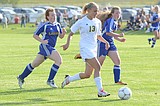 Lady Dogs soccer blanks Loggers