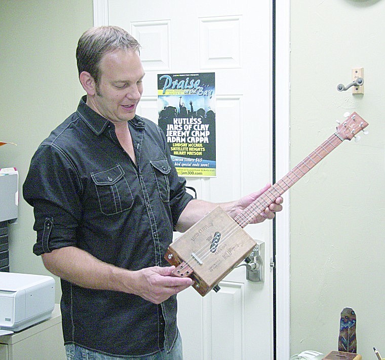 &lt;p&gt;Nathan Eyre showcases a guitar made with a Lord Clifford cigar box from the 1930s.&lt;/p&gt;