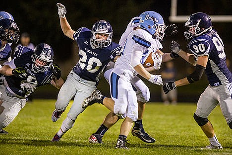 &lt;p&gt;Lake City senior Dakota Kielblock (20) lines up to tackle Central Valley senior Ben Craig, center, Friday night at Lake City High School.&lt;/p&gt;