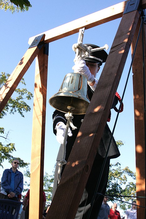 &lt;p&gt;Shaena Dunn of Kootenai County Fire and Rescue performs &Ograve;Striking Four Fives,&Oacute; a bell tradition to honor fallen comrades.&lt;/p&gt;