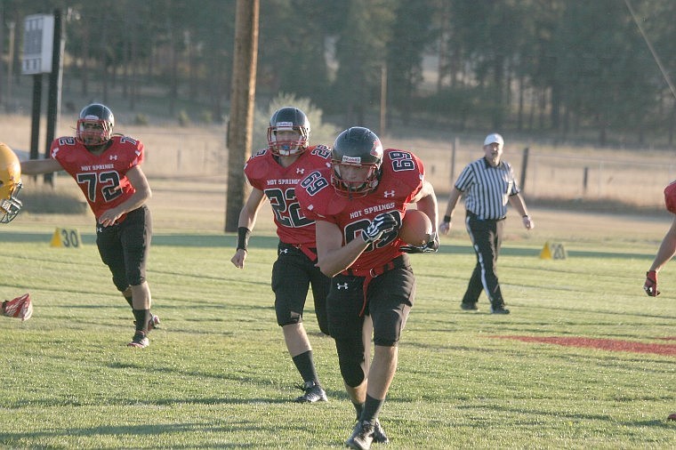 &lt;p&gt;Dave Cross carries the ball to gain 10 yards Friday, Sept. 7 &#160;against St. Regis.&lt;/p&gt;