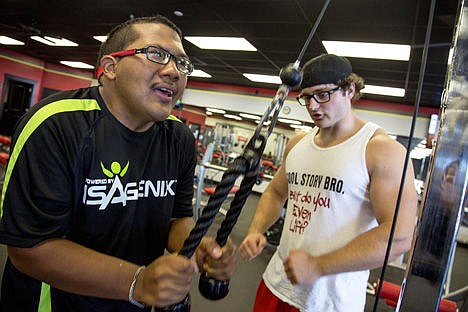 &lt;p&gt;Frank Brown works out with help from Tanner Bryan at SNAP Fitness in Roy, Utah, aug. 12.&lt;/p&gt;