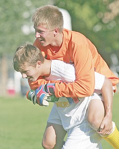 &lt;p&gt;Jason Schnackenberg takes care of his keeper Austin Nagle post game.&lt;/p&gt;