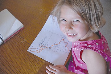 &lt;p&gt;Clara Lighthiser, 5, works on a hand-drawn map showing her family's path this summer.&lt;/p&gt;