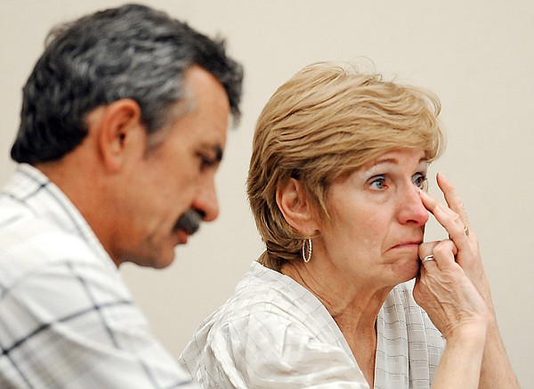 &lt;p&gt;Cheryl Lee Criswell wipes her eyes as attorneys give their opening statements Sept. 6, 2011. She and her husband, Edwin, are appealing their conviction of aggravated cruelty to animals.&lt;/p&gt;