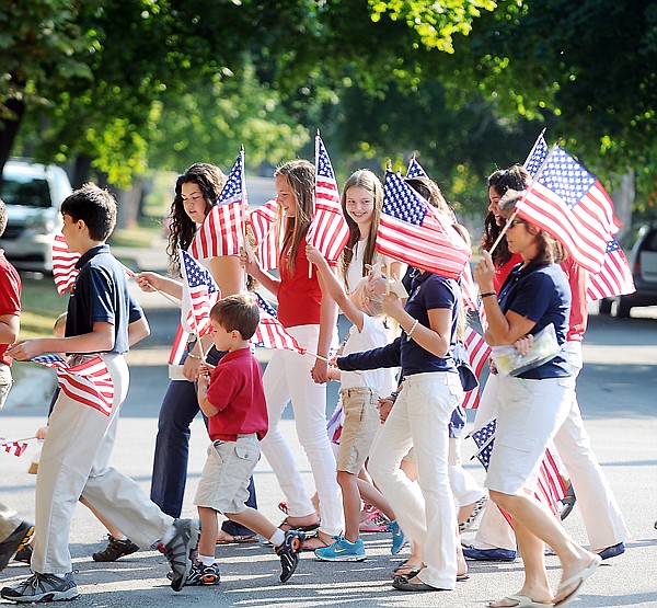 &lt;p&gt;Flags were held high as students, staff and family members from
walked from Saint Matthew's Catholic Church to the Kalispell Fire
Department on Friday morning. They carried 343 flags in honor of
the first responders who died in the 9/11 terrorist attacks. The
first of these memorial flags was placed by Father Rod Ermatinger
in memory of Chaplain of the New York Fire Department Fahter Mychal
Judge who died in the terrorist attack on the World Trade
Center.&lt;/p&gt;