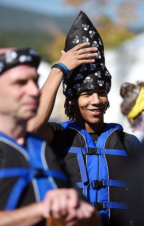 <p>Jelani Morgan of Kalispell, a member of the Tsunami Torrent Pirates preparing for a race at the Montana Dragon Boat Festival on Saturday, September 12, in Lakeside. (Brenda Ahearn/Daily Inter Lake)</p>