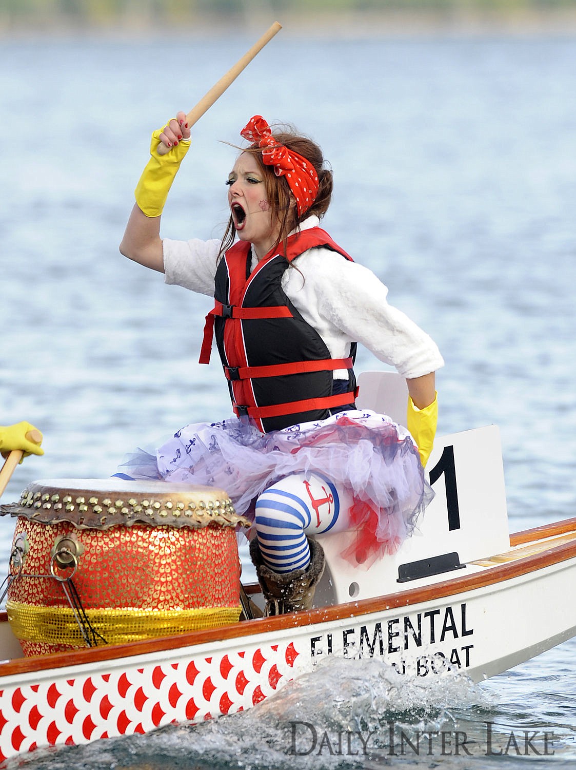 <p>Jessi Way, the drummer for the Riveting Rosies, shouts out orders during a race at the Montana Dragon Boat Festival.</p>