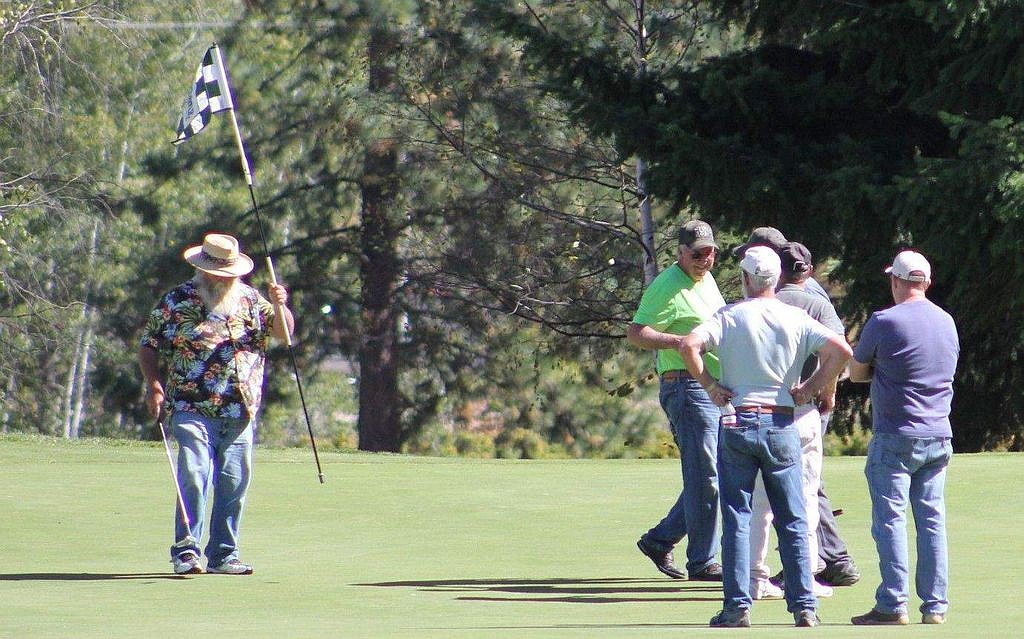 The biggest prize is $50,000 for a hole-in-one on the seventh green. Nobody has ever won the prize, but that didn't stop Golf Pro, Dan Park, Jack Knulty, Jim Miller (holding the flag) and Bruce Piatkowski, from trying&lt;/p&gt;