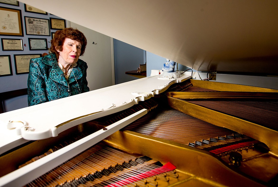 &lt;p&gt;Pat Weeks plays her 1977 Vose &amp; Sons white baby grand piano on Monday in her Post Falls home studio, where she teaches piano lessons. In her 58-year-long teaching career, Weeks has taught about 6,400 students.&lt;/p&gt;