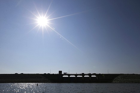 &lt;p&gt;The sun rises over the dam at Lake Red Rock, Monday, Aug. 26, 2013, near Pella, Iowa.&lt;/p&gt;