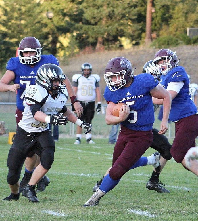 Nick Turnbull, #5, led the Mountain Cats with 198 yards and 4 touchdowns in a 54-16 win against Seeley-Swan