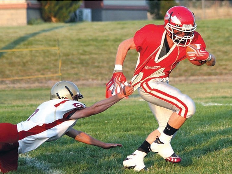 &lt;p&gt;Arlee senior running back Zach Tameler pulls away from a
Philipsburg defender last Friday night.&#160;&lt;/p&gt;