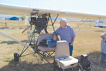 &lt;p&gt;&quot;Breezy&quot; Bob Alm and his open-air plane.&lt;/p&gt;