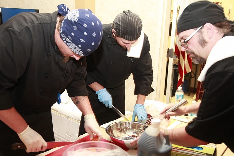 &lt;p&gt;Chef Mike Slabaugh, right, of Nickel Charlie's is hard at work whipping up a caramel spiced sponge cake with his team on Friday night.&lt;/p&gt;