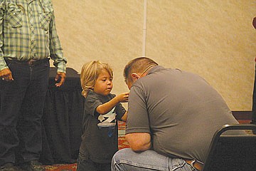 &lt;p&gt;At right, Matiya Nenemay presents Sen. Jon Tester with a necklace.&lt;/p&gt;