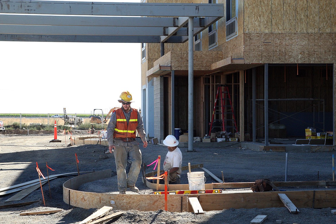 Construction crews work on the Fairfield Inn &amp; Suites by Marriott at 2420 Maiers Rd. The three story, 84-room project is expected to go into its exterior phase next week. Crews are three weeks away from doing curb work and pouring cement and doing asphalt work. The project is currently on schedule and is expected to be completed around April of 2017.