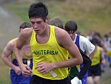 Harriers post good times in rain against tough rivals
