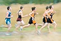 A group of Flathead High School cross country runners push ahead of the pack at the Flathead Invitational Saturday morning at Kidsport in Kalispell. The Flathead boys finished second while the FHS girls claimed the team title. Chris Jordan/ Daily Inter Lake