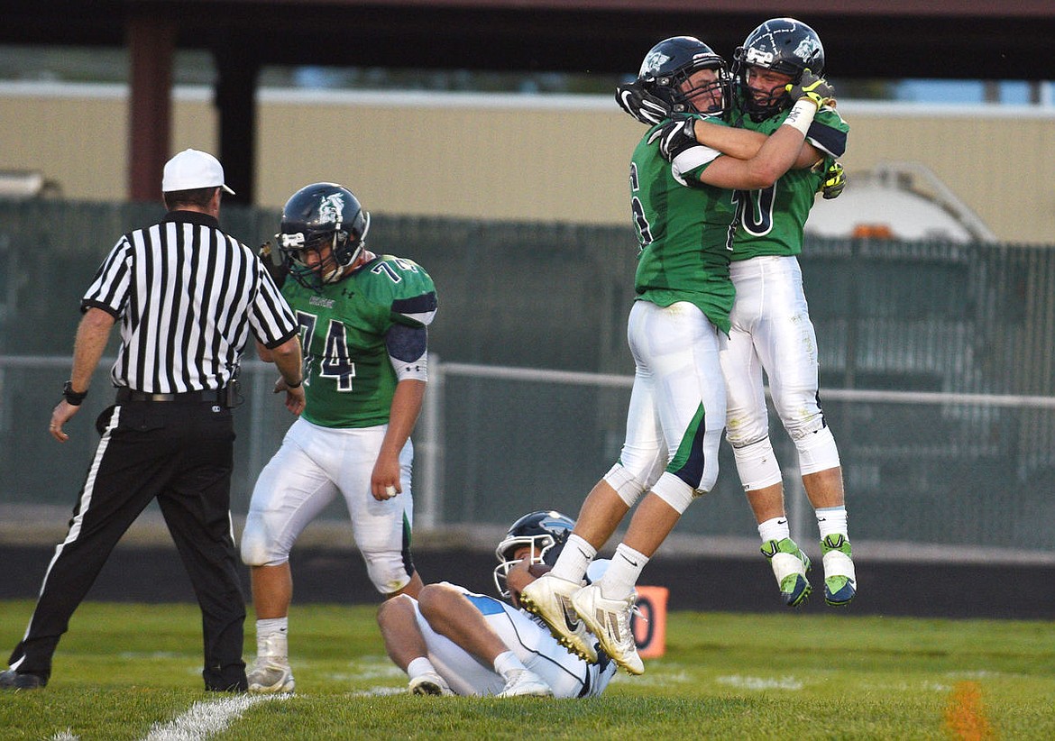 &lt;p&gt;Glacier defenders Patrick O'Connell (16) and Seth Anderson (20) celebrate after sacking Great Falls quarterback Kevin Boes during the second quarter at Legends Stadium. (Aaric Bryan/Daily Inter Lake)&lt;/p&gt;