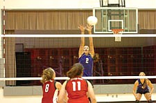 Sophomore Derika Stipe goes up for a block against Hot Springs.